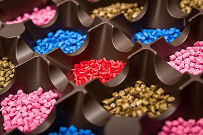 The raw plastic pellets used in injection molding