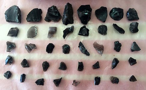 Obsidian stone tools and tool-making debris